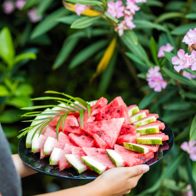 A vibrant raw food platter showcasing a variety of fresh fruits and vegetables, colorful and appeali