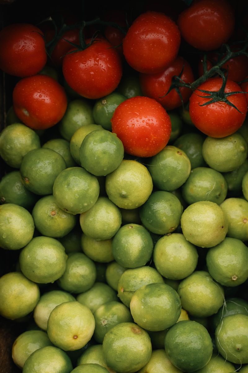 An inviting display of fresh raw fruits and vegetables, bright and colorful, showcasing the abundanc
